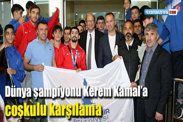 Dünya şampiyonu Kerem Kamal’a coşkulu karşılama haberinin görseli