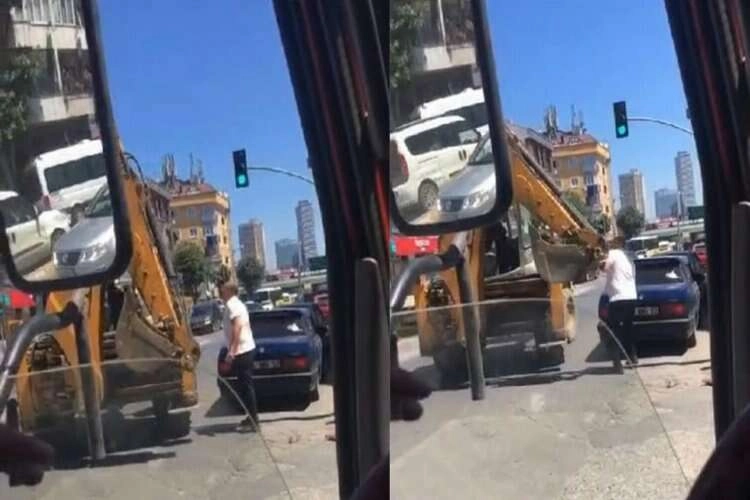 Operatör, kepçe ile trafikte otomobile vurmaya çalıştı haberinin görseli