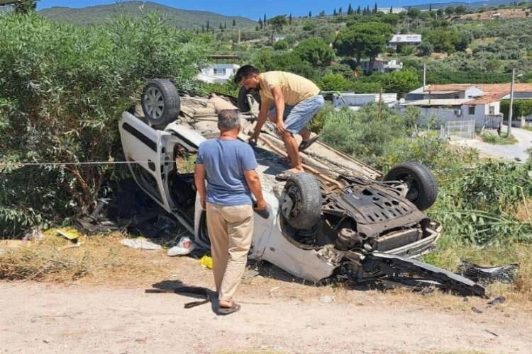 Aydın'da virajı alamayan araç takla attı