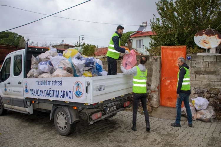 Dikili Belediyesi, hem evleri hem de kalpleri ısıtıyor