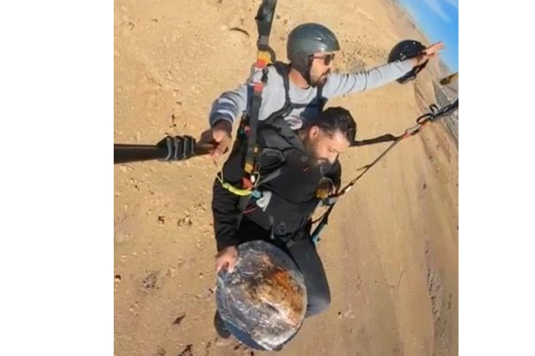 Yemek siparişini paraşütle götürdü haberinin görseli