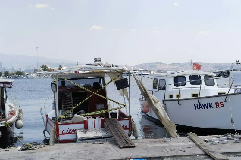 İzmir'de teknedeki buzdolabına gizlenmiş kadın cesedini narkotik köpeği fark etmiş haberinin görseli