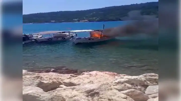 Yanan tekneye hortum, jet ski ve flyboard ile müdahale