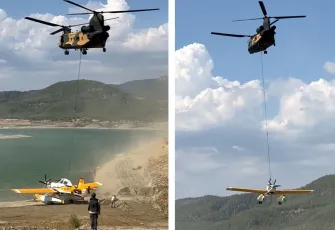 Kırıma uğrayan yangın söndürme uçağı gölden askeri helikopterle taşındı
