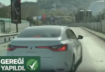 Başka aracın önünü kesmeye çalışan trafik magandası yakalandı