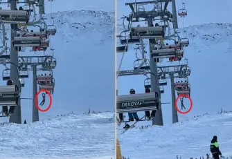 Düşen snowboardını için atladı, telesiyejde asılı kaldı