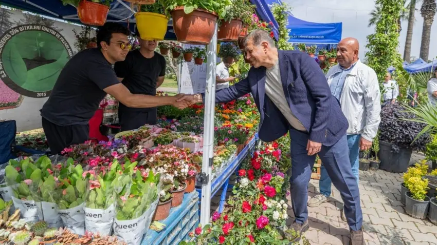 BAŞKAN TUGAY VE &Uuml;RETİCİ