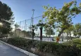 İzmir’de parkta tenis kortu tepkisi: Ağaç kesildi iddiası