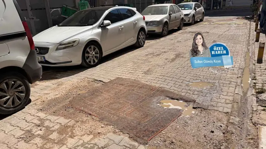 Çukurlara çözüm gelmedi, yola halı serildi haberinin görseli