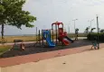 Menderes Belediyesi sahil bölgesindeki 3 parkın oyun gruplarını yeniledi