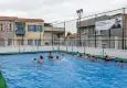 Büyükşehir'in portatif havuzu çocuklara ücretsiz yüzme imkânı sunuyor