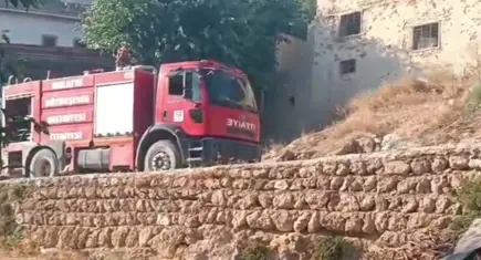 Bahçe yangını yerleşim yerine sıçradı:19 kişi dumandan etkilendi