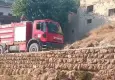 Bahçe yangını yerleşim yerine sıçradı:19 kişi dumandan etkilendi