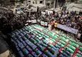 Gazze’de yıkıntılar arasından çıkarılan 100 Filistinli toprağa veriliyor