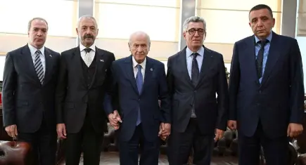 Devlet Bahçeli, Sarallar ve Şahinler aileleriyle bir araya geldi