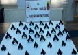 Sokak ortasında silah operasyonu: Oyuncak poşetinden 50 tabanca çıktı haberinin görseli